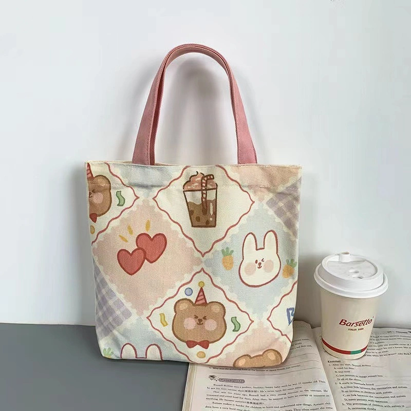 Wholesale/Supplier Kids' High quality/High cost performance  Fashionable Cartoon Print Colour Canvas Tote Bag Shopping Bag for Student Lunch Cylinder Bento Bag