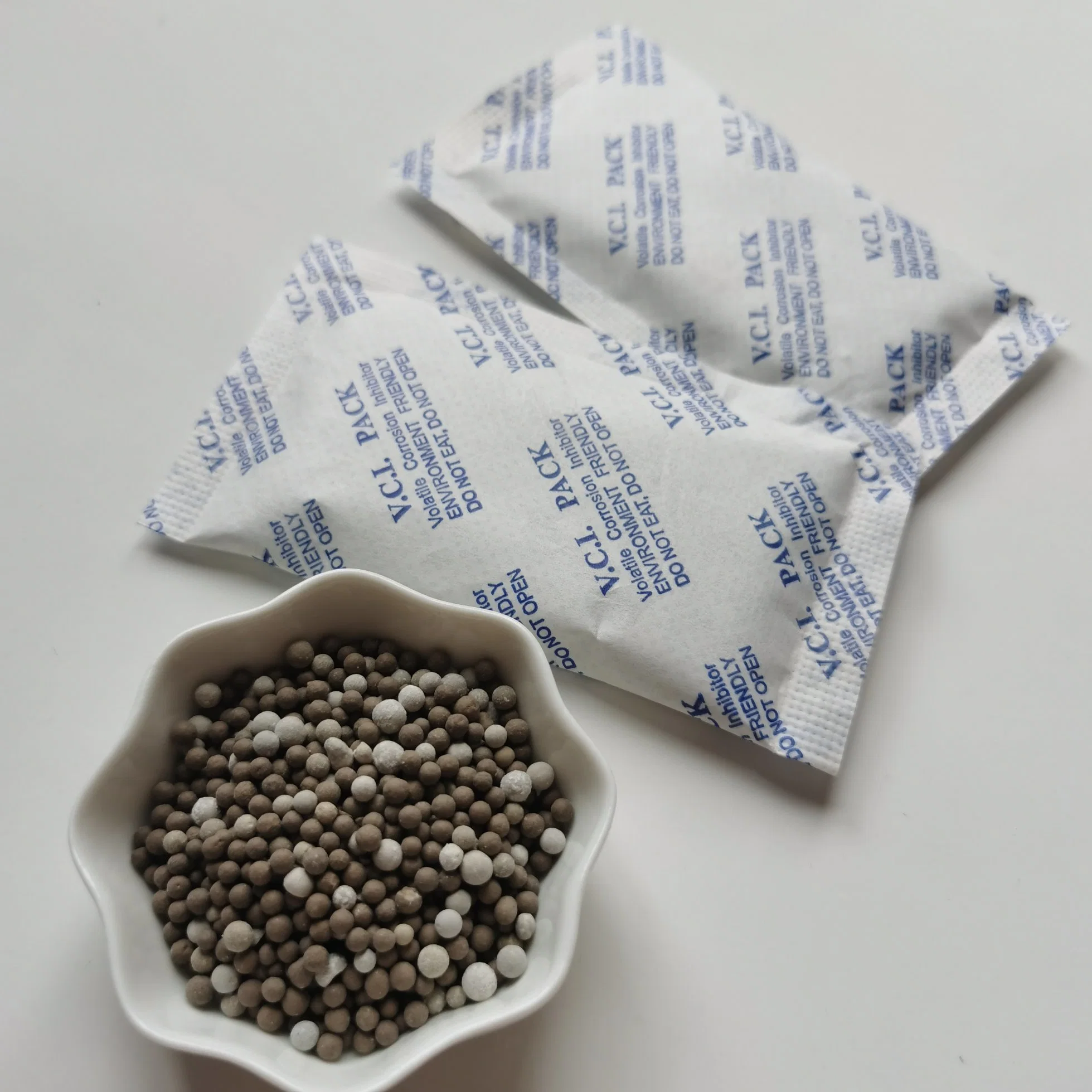 Vci Kraft Paper Reusable Calcium Chloride Clay Desiccant for Auto Spare Parts Anti-Rust Packaging