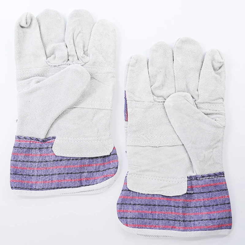 Gants en cuir de vache gris/rayé avec paume renforcée, dos en coton rayé, poignet collé avec doublure en tissu. Qualité Ab/Bc pour entrepôts de marchandises, construction. Luvas, Guantes.