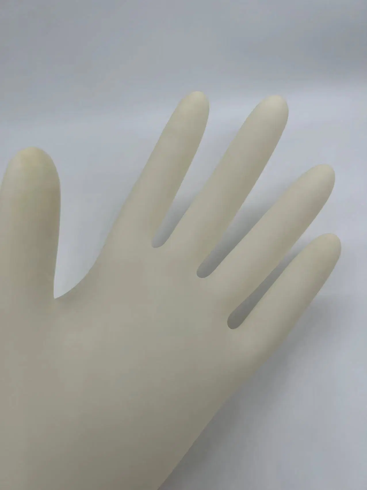 En Stock Los guantes de látex guantes quirúrgicos desechables de látex Examen Medico guantes estériles