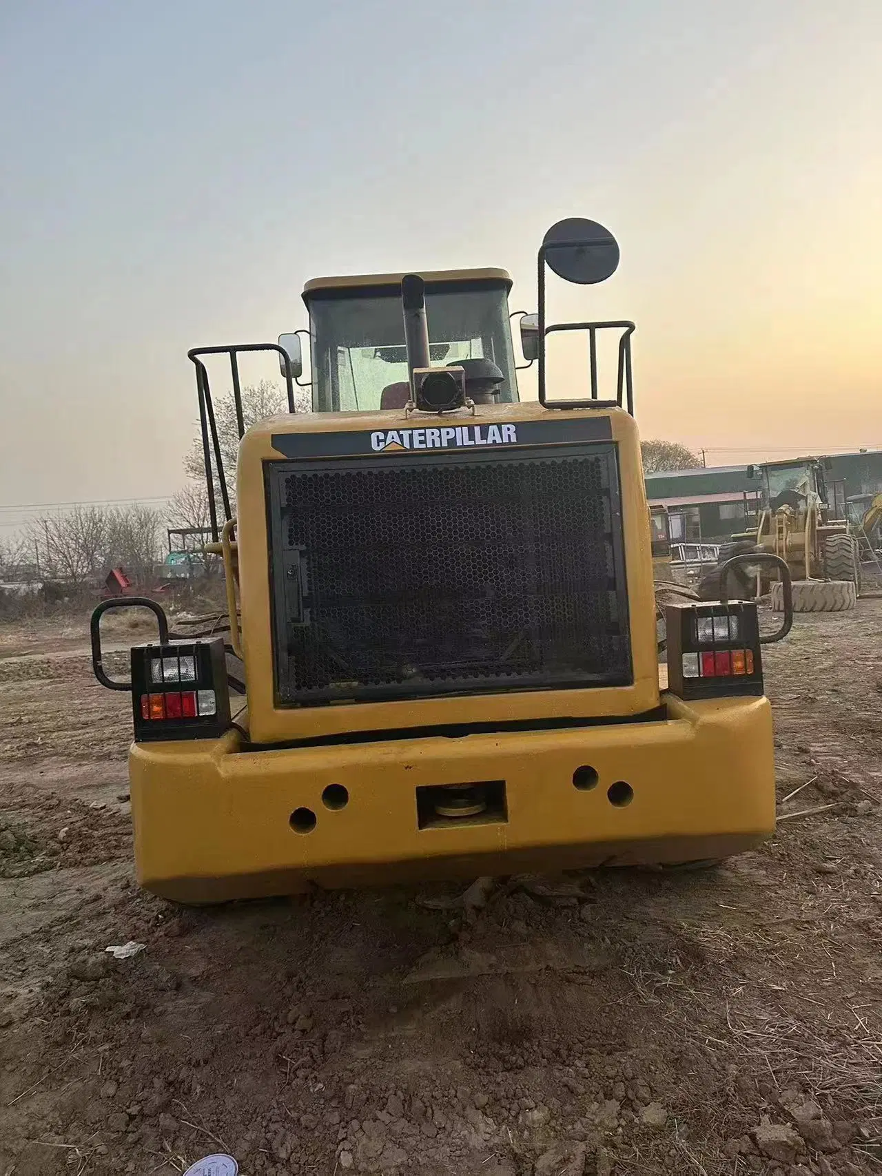 اللودر بعجل المستخدم Cat 966H للبيع من Caterpillar