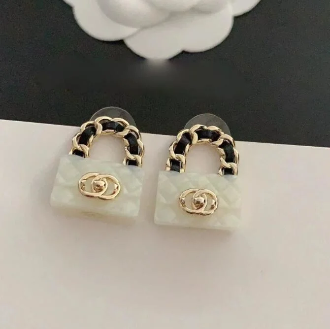 High quality/High cost performance  Silver Needle Light Luxury Earrings Bag Shape Buckle Rhombus Plaid Fashion Retro Stud Earrings