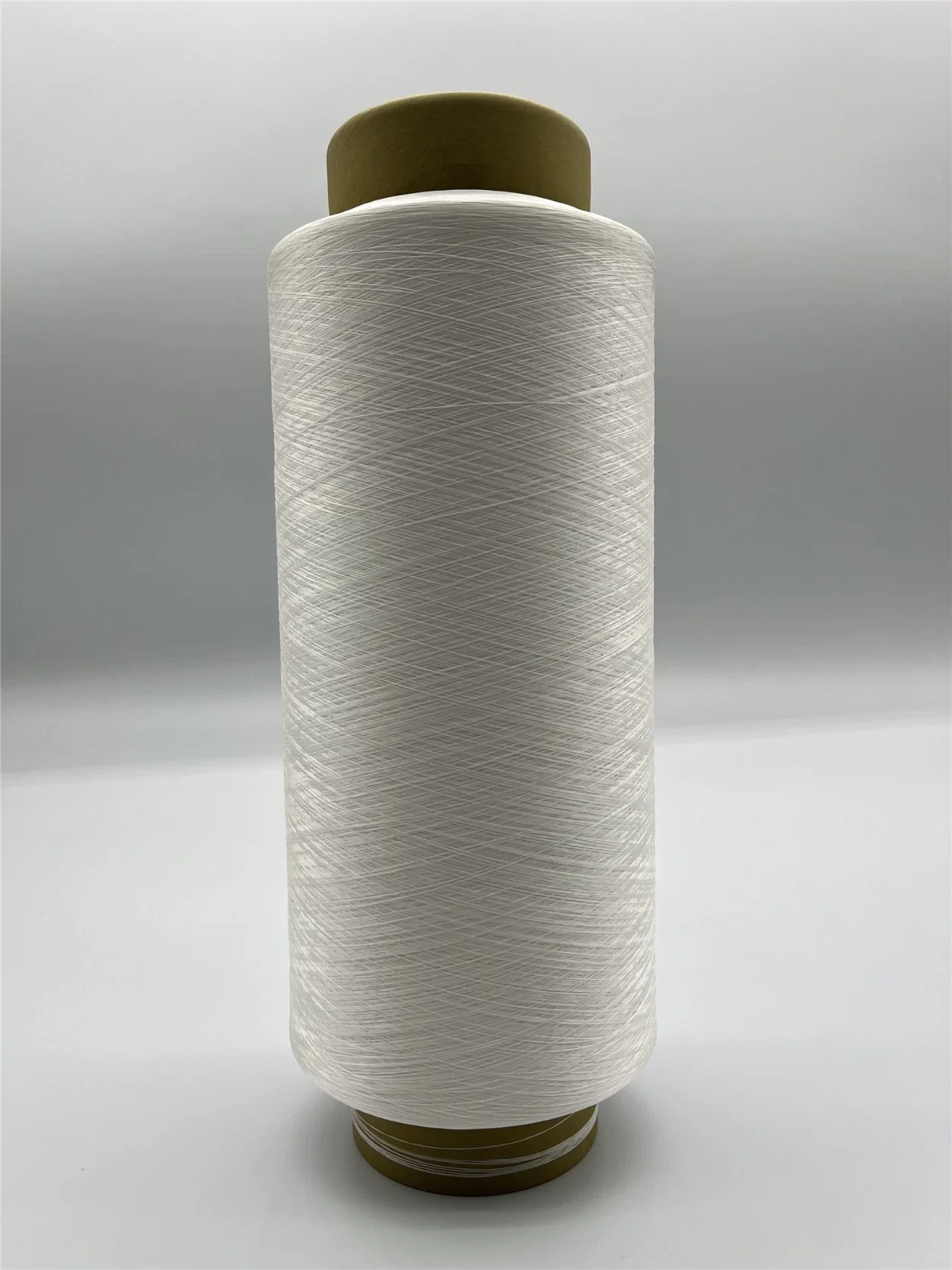 Excellent DTY PBT haute élastique fil 100D/36F Matières premières textiles filés de polyester pour le tricotage et de tissage Maillot
