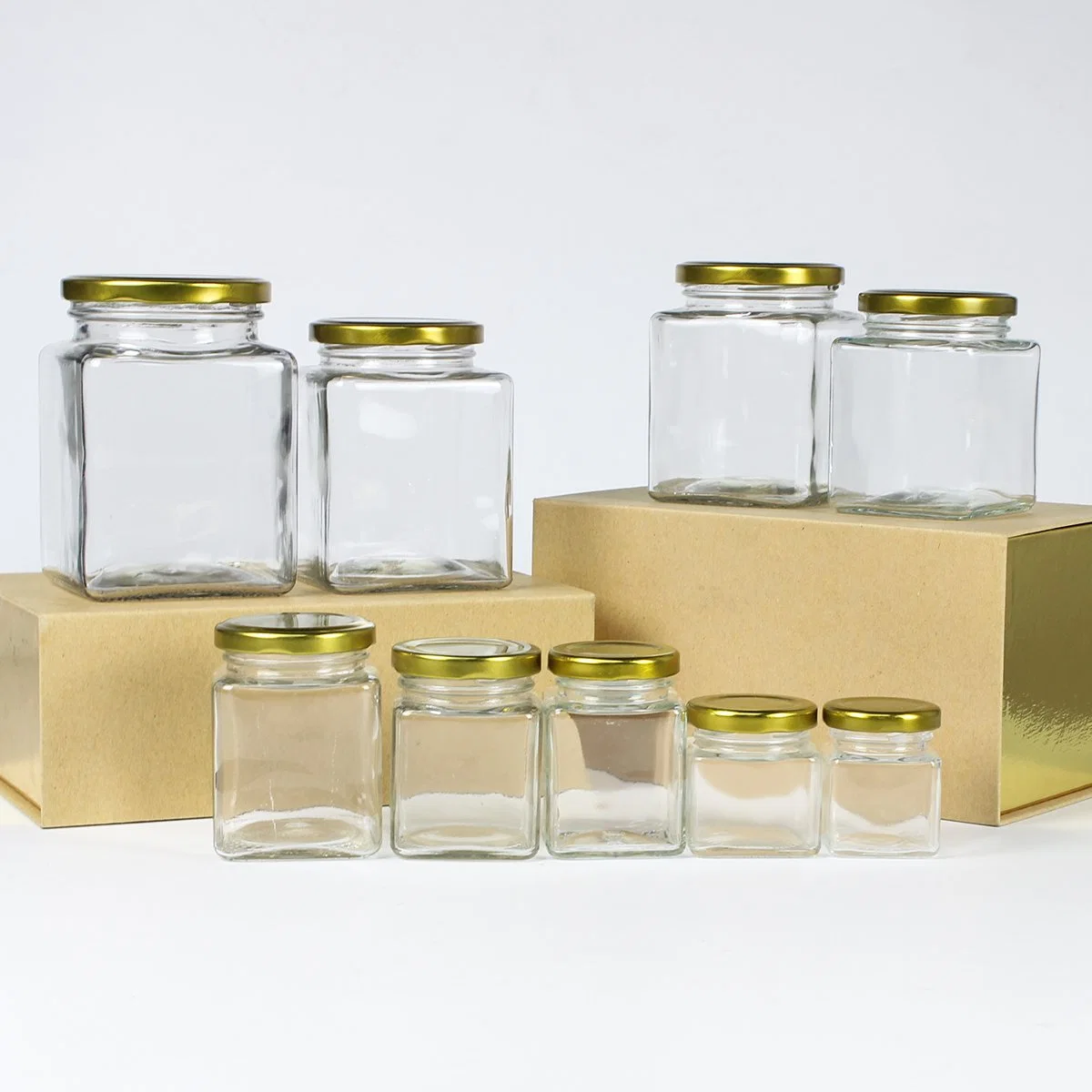 Wholesale/Supplier Empty Square Clear Food Storage Container Honey Glass Jar with Metal Lid