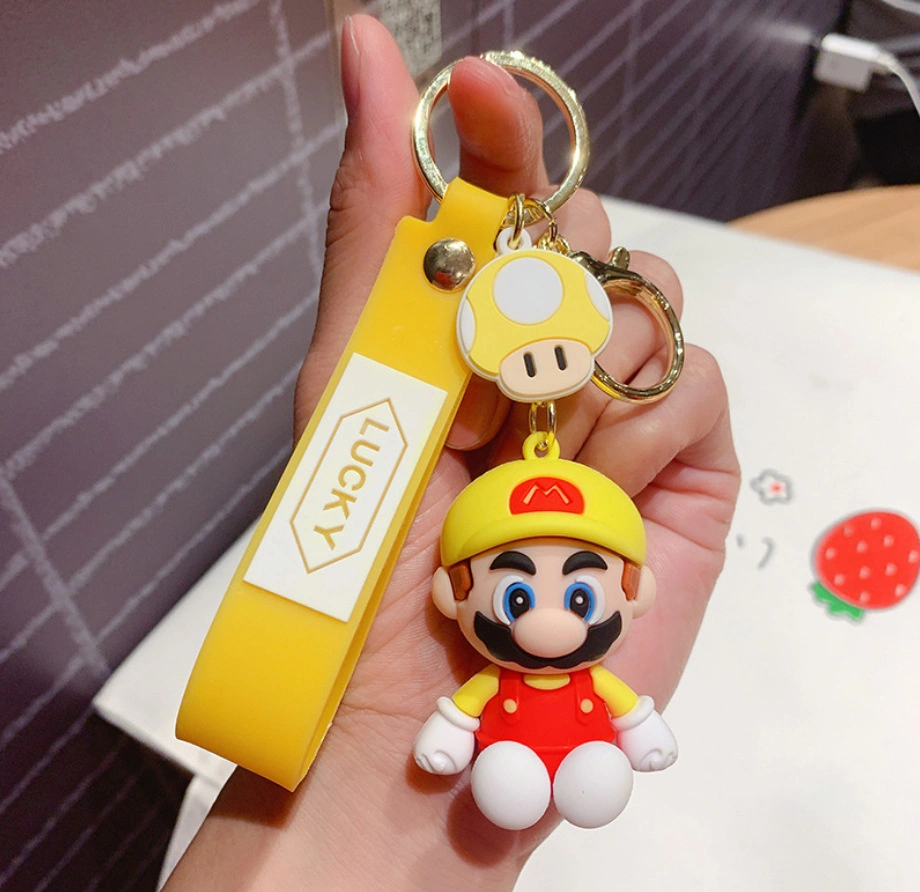 Fábrica al por mayor 3D Kawaii Japón ANIME personajes Juego de Chute Charm Super Mario Bro PVC Cartoon llavero para niñas Colgante Llavero