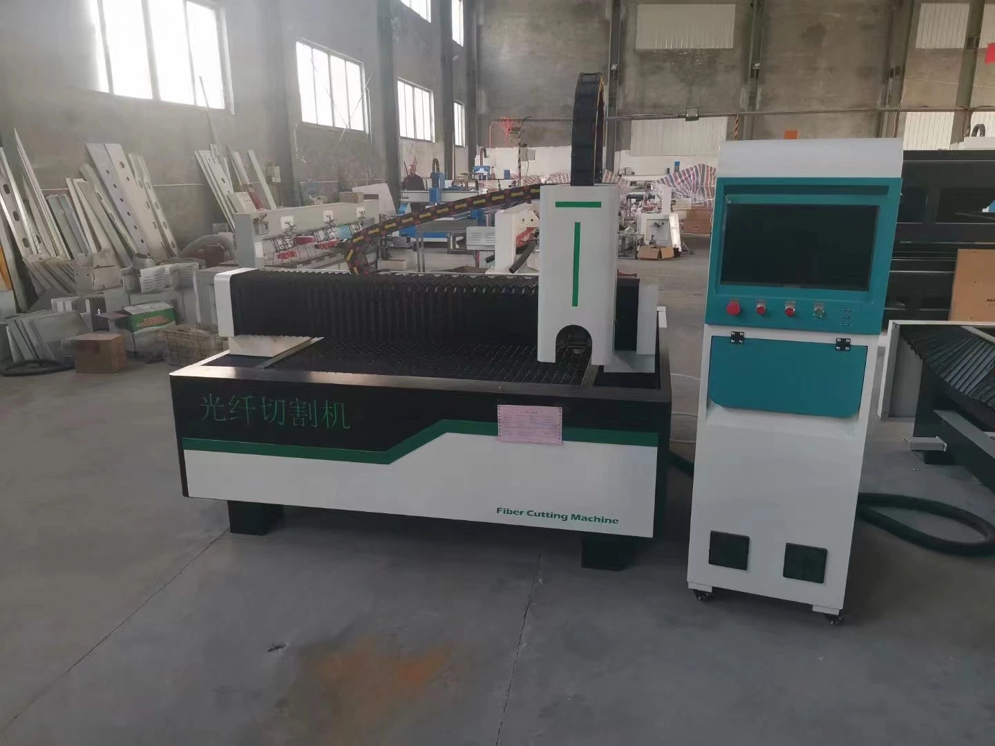 Manufacture Exhibition Products 1500W CNC Metal Fiber Laser Cutting Machine Sheet Metal Price