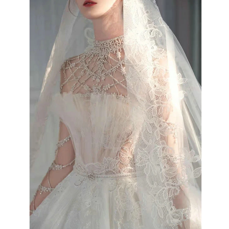 New Sexy Long-Sleeved Wedding Dress Bridal Wedding Dress Lace Big Tail