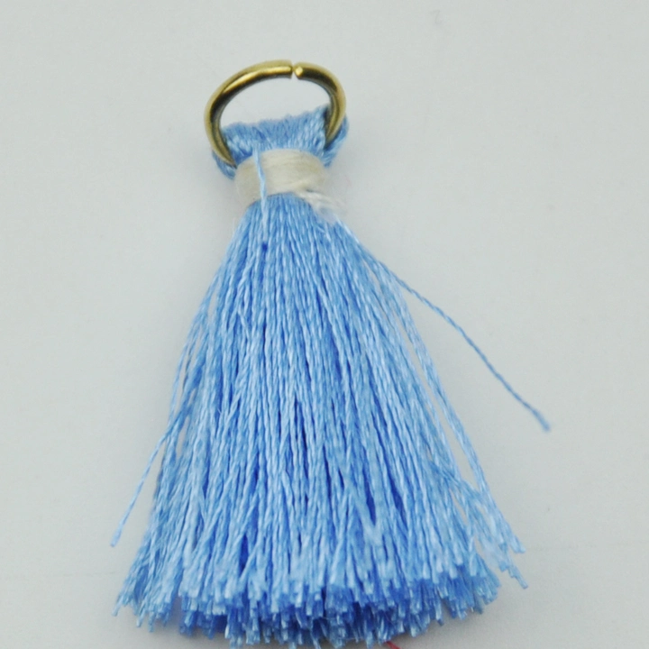 Wholesale/Supplier Small Fashion Polyester with Metal Ring Tassel for Garment