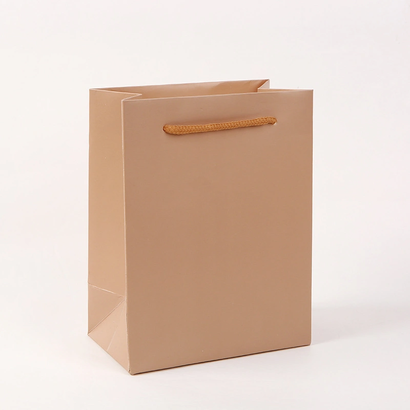 Wholesale/Supplier Simple Paper Gift Bags Kraft Paper Candy Boxes with Handles Wedding Birthday Party Gift Packaging Custom