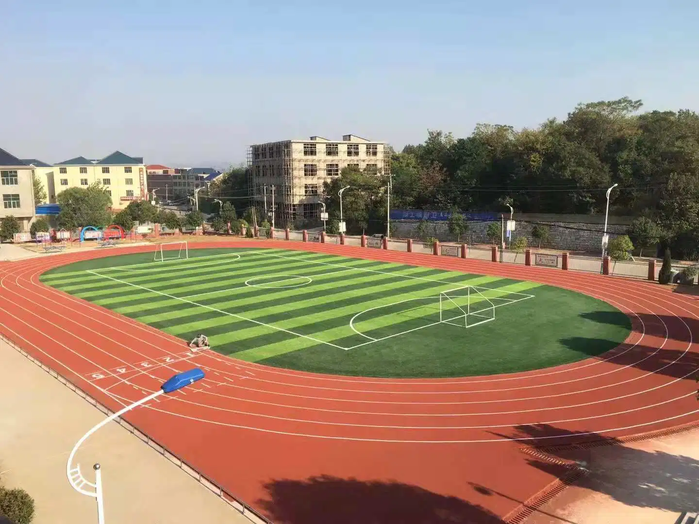 Escudo de pulverización de pista y campo de caucho pistas Pista de Atletismo Factory