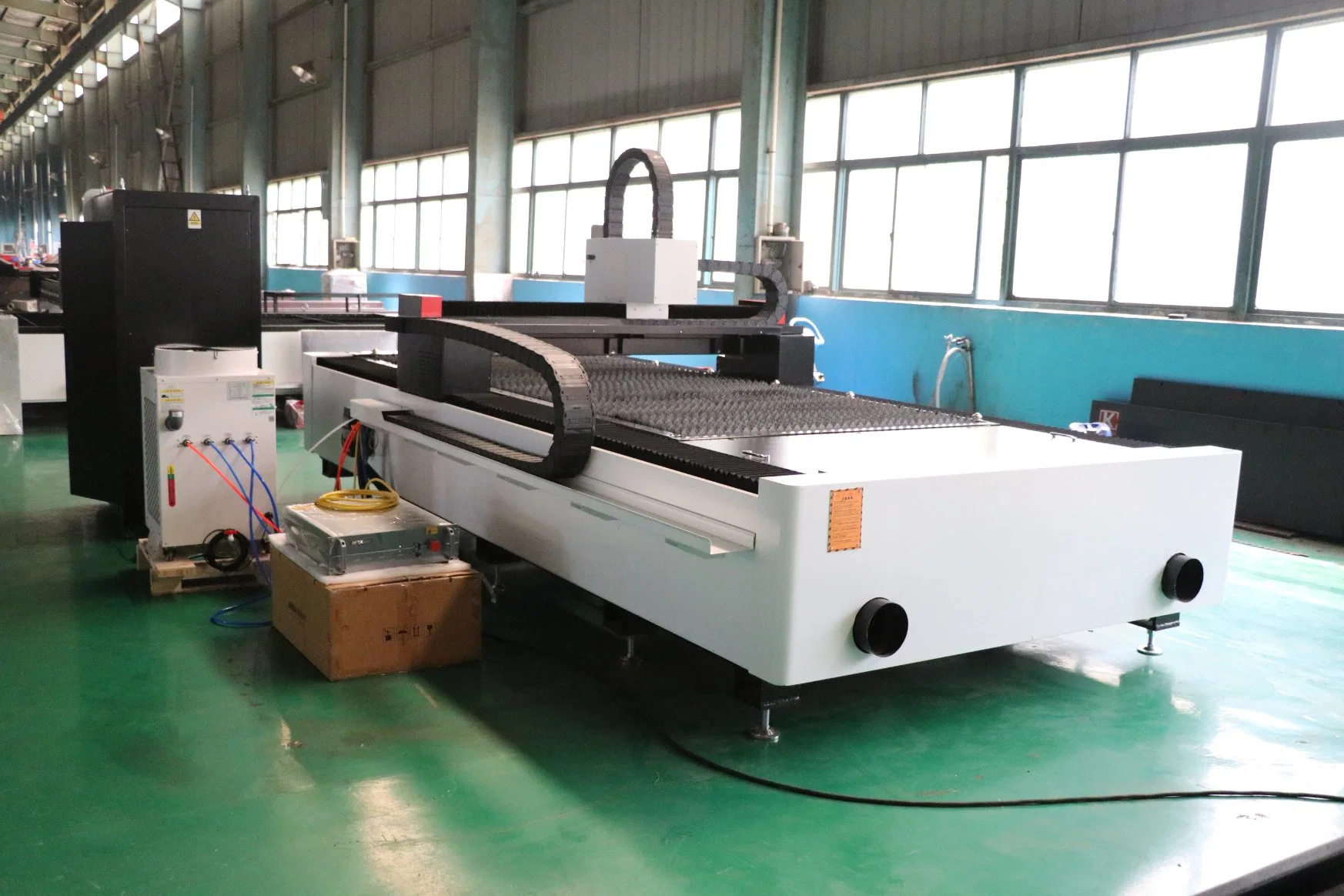 Máquina de corte a laser máquina de corte a laser de ferro 2000W Jq máquina a laser máquina de corte CNC Laser Corte