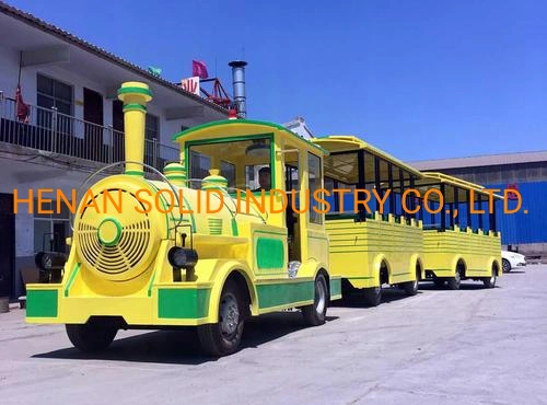 Parque de atracciones a los niños pequeños Trackless viaje en tren en el jardín público