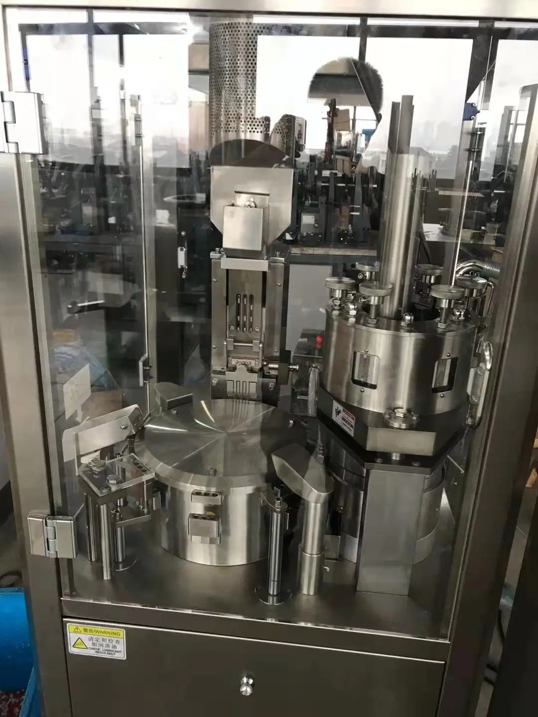 Nouveau design les plus populaires de la poudre automatique complet Granule Pellet Capsule Machine de remplissage haute efficacité et économie d'énergie