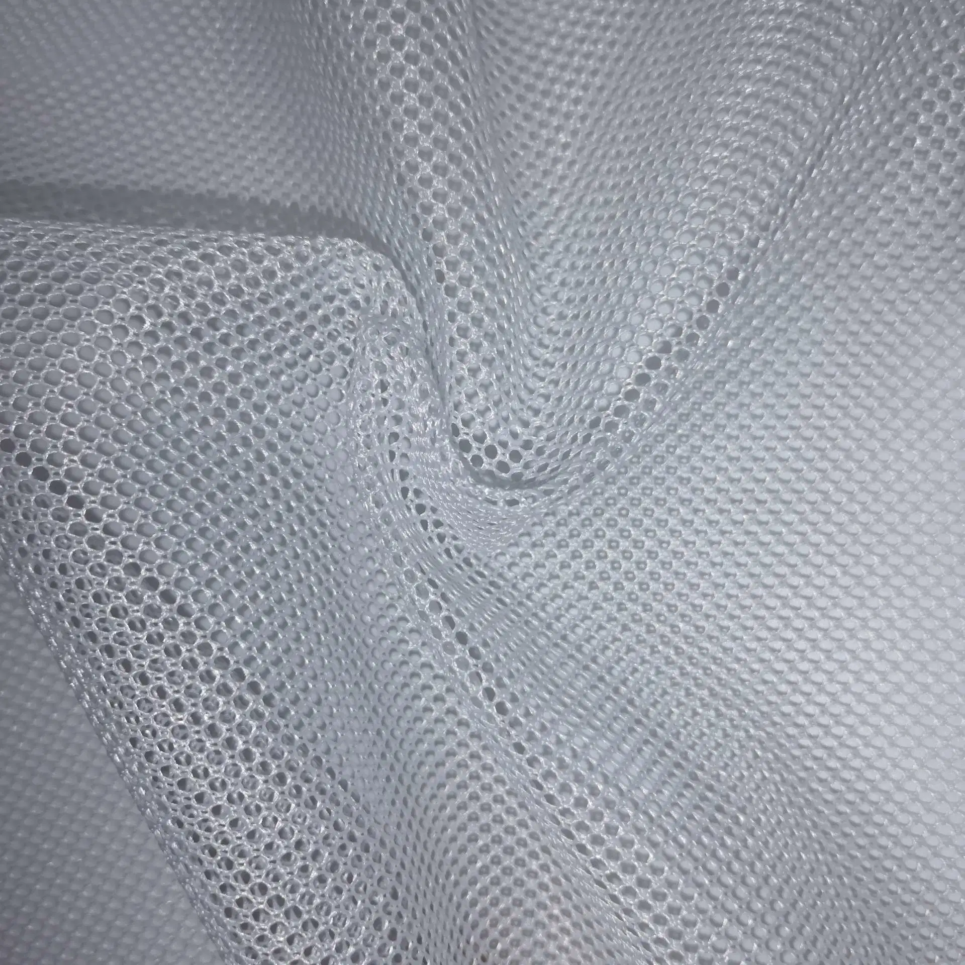Suave y Wearproof tejido de malla de poliéster 100% Net/Prenda de punto de malla de tejido de revestimiento/tapa para el revestimiento