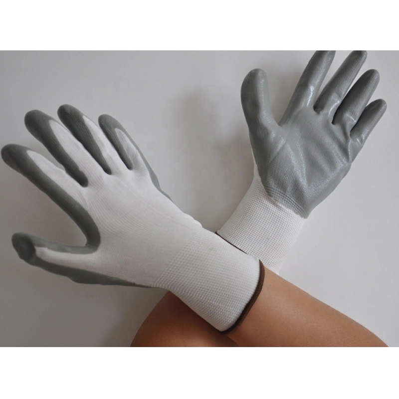 Gants de travail de sécurité en nylon polyester enduits de nitrile avec certification CE en gros bon marché.