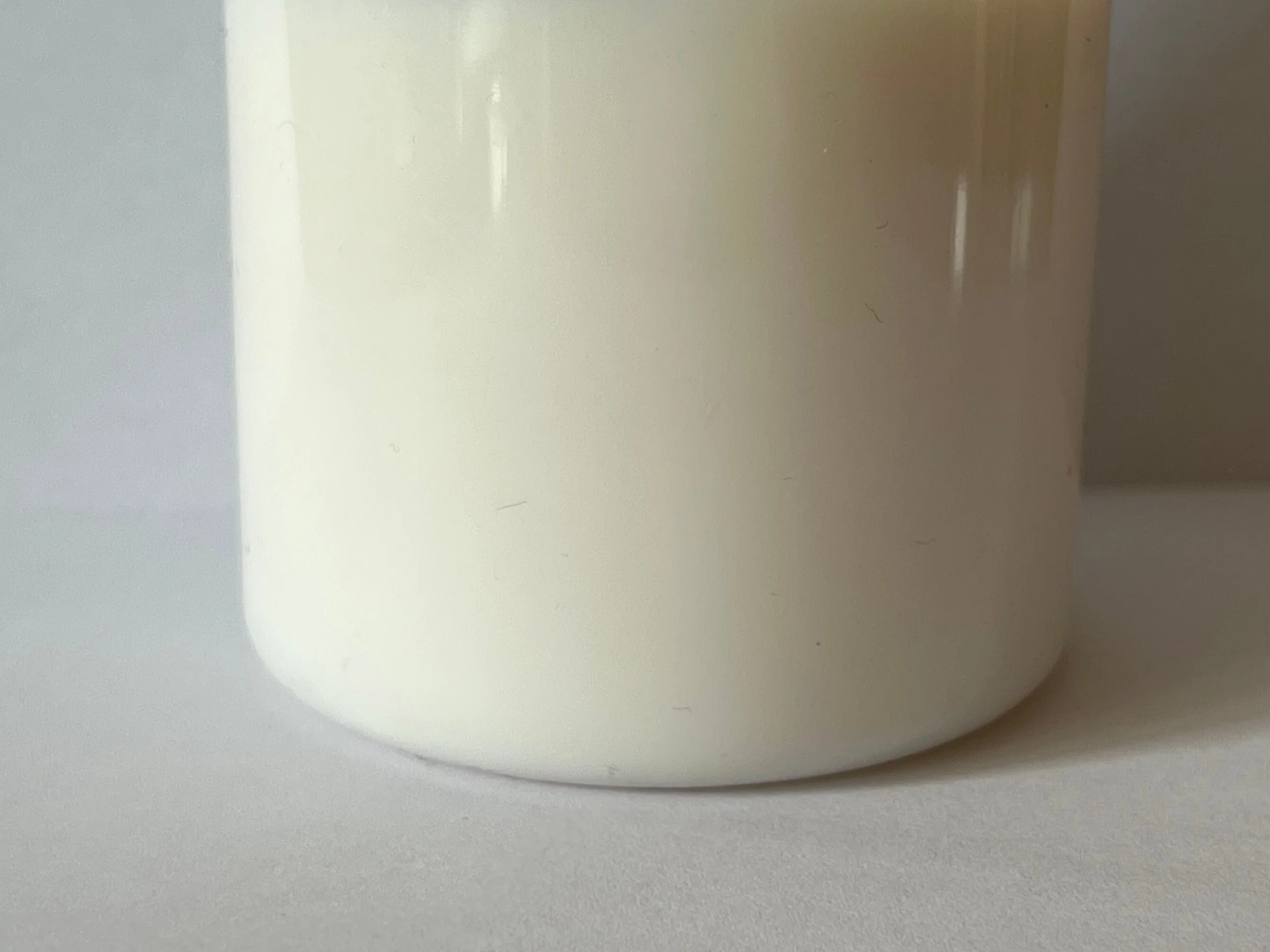 Milky-White Liquid Stability Waterproof Crosslinking Agent JL-107 for Chemical Fiber, Cotton and Their Blended Fabrics