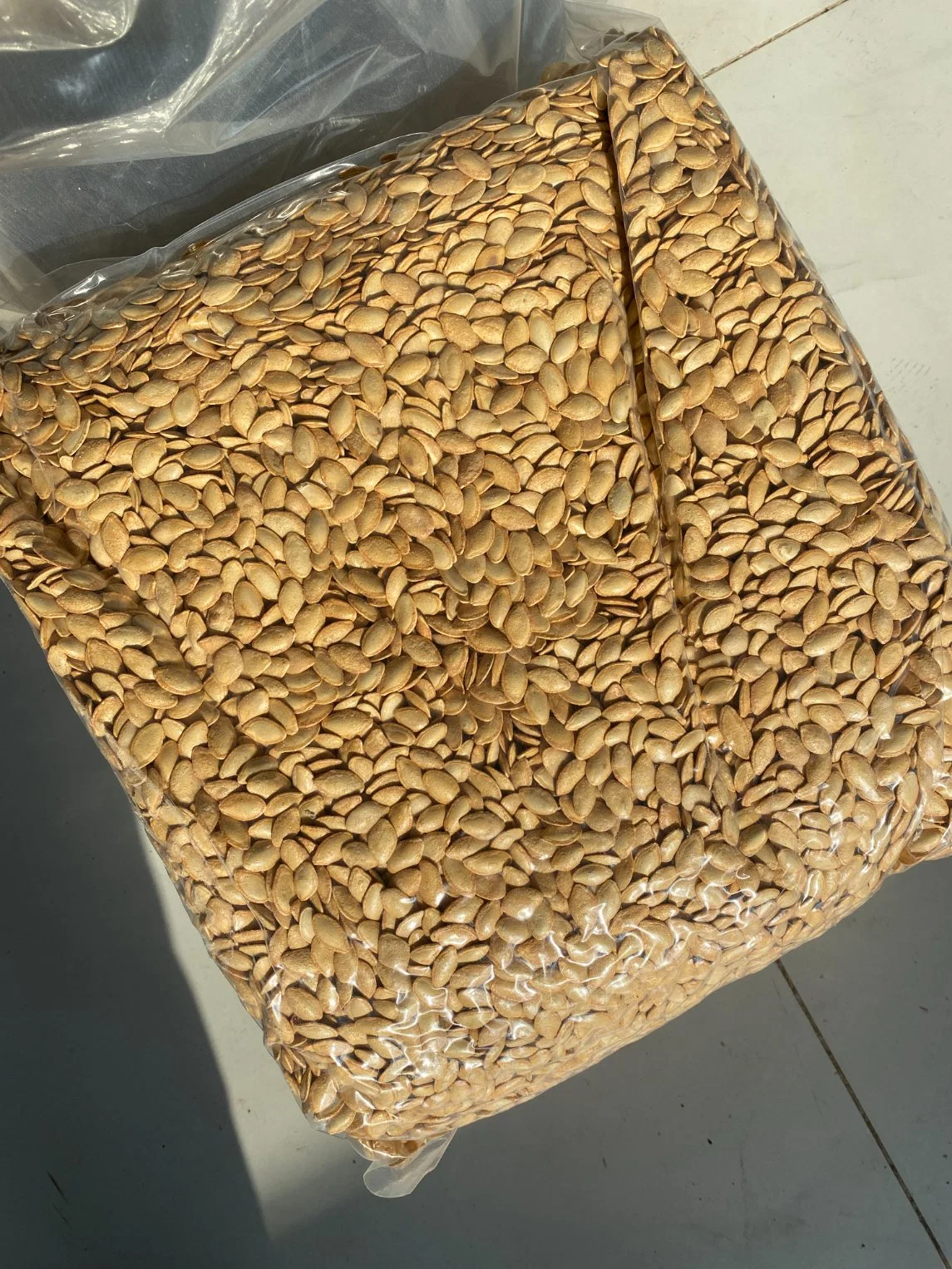 High quality/High cost performance Export China Raw Lady Nail Pumpkin Seeds with Shell 8mm