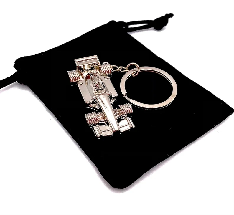 Wholesale/Supplier Metal Crafts Zinc Alloy 3D Formula 1 Racing Car Key Ring Self Defense Accessories Float Beaded F1 Event Custom Hot Selling Meta Keychain