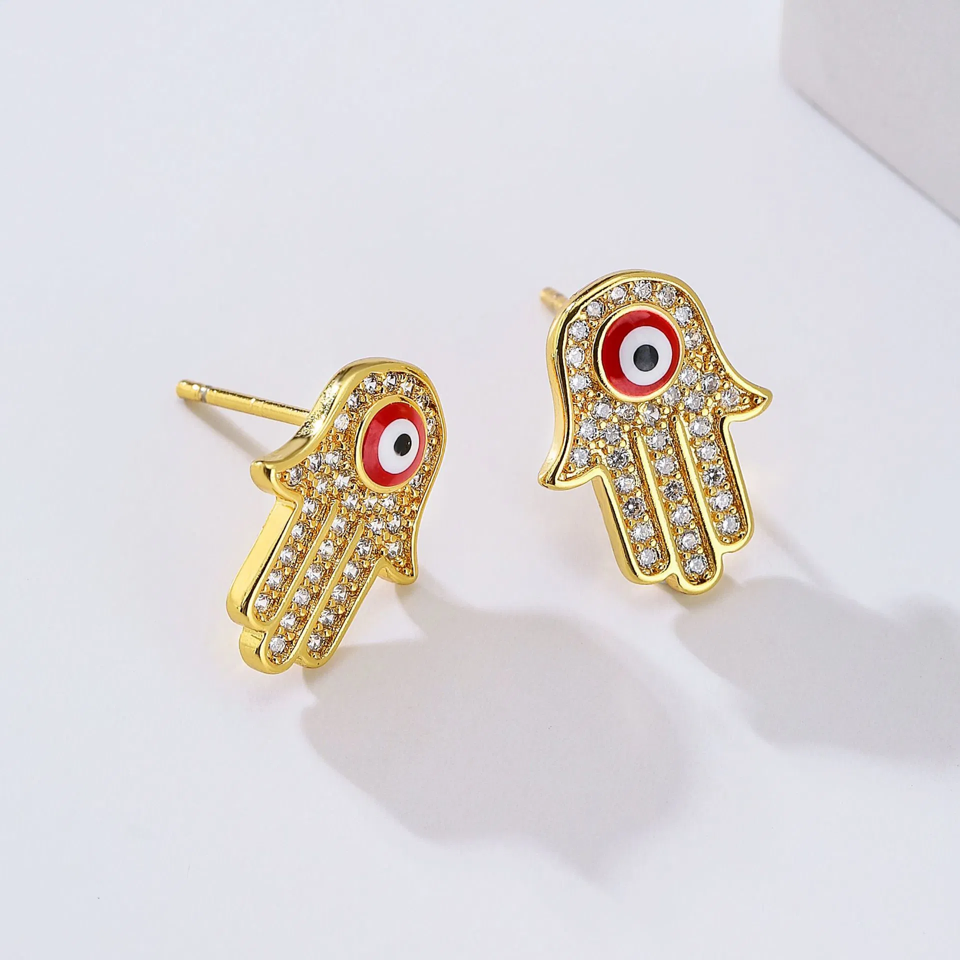 Europäische und amerikanische Mode Kupfer überzogenem 18K Gold Micro-Inset Zircon Fatima Hand Eye Ohrstecker Weibliche Schmuck