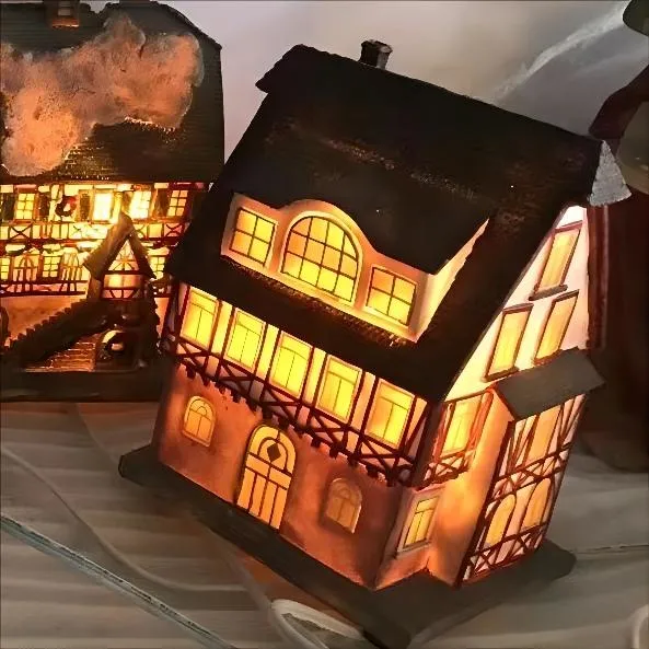 OEM Factory Customized Christmas House Gift Lighted Resin Christmas House Craft Tiny Little Small Mini Polyresin Light House Manufacturer in China