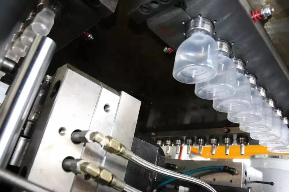 Remplacement facile du moule en plastique PET étirement d'injection soufflage automatique PP Flacon de machine de moulage par soufflage