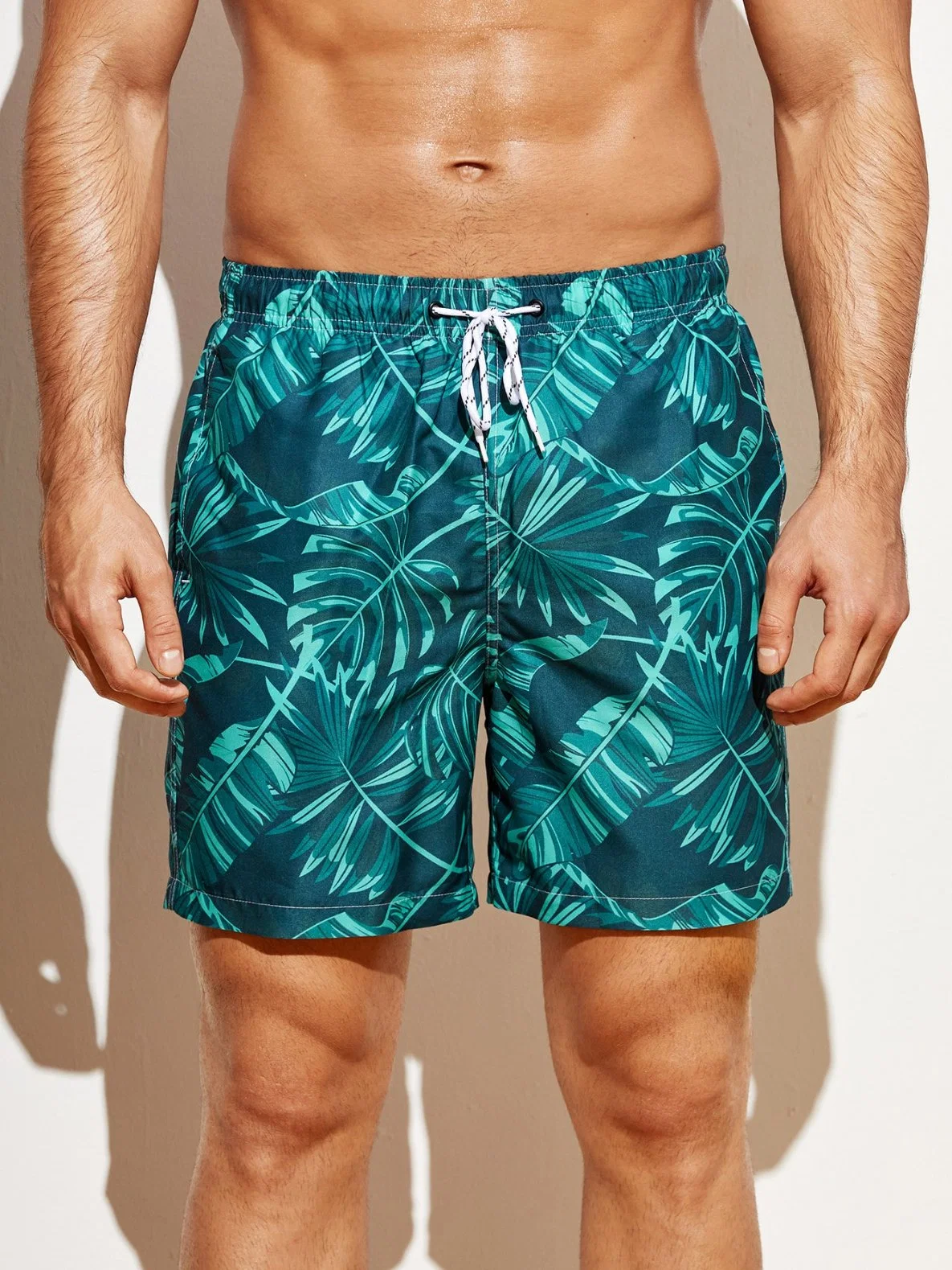 Wholesale/Supplier 2023 Summer New Men's Holiday Swimming Trunks Shorts OEM Custom Logo Printing Tropical Print Drawstring Waist Swim Trunks for Men