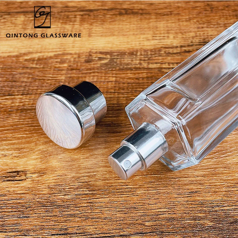 Wholesale/Supplier 50ml 100ml Hexagonal Cosmetics Fragrance Glass Packaging Perfume Bottle with Black and Silver Cap