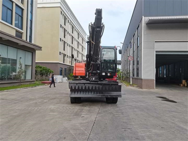 Escavadeira de rodas com material fazenda de Nivelamento da Máquina