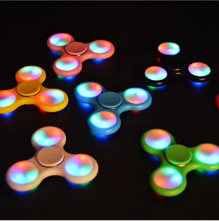 Best Seller Tri Fidget mano Spinner Toy con luces LED