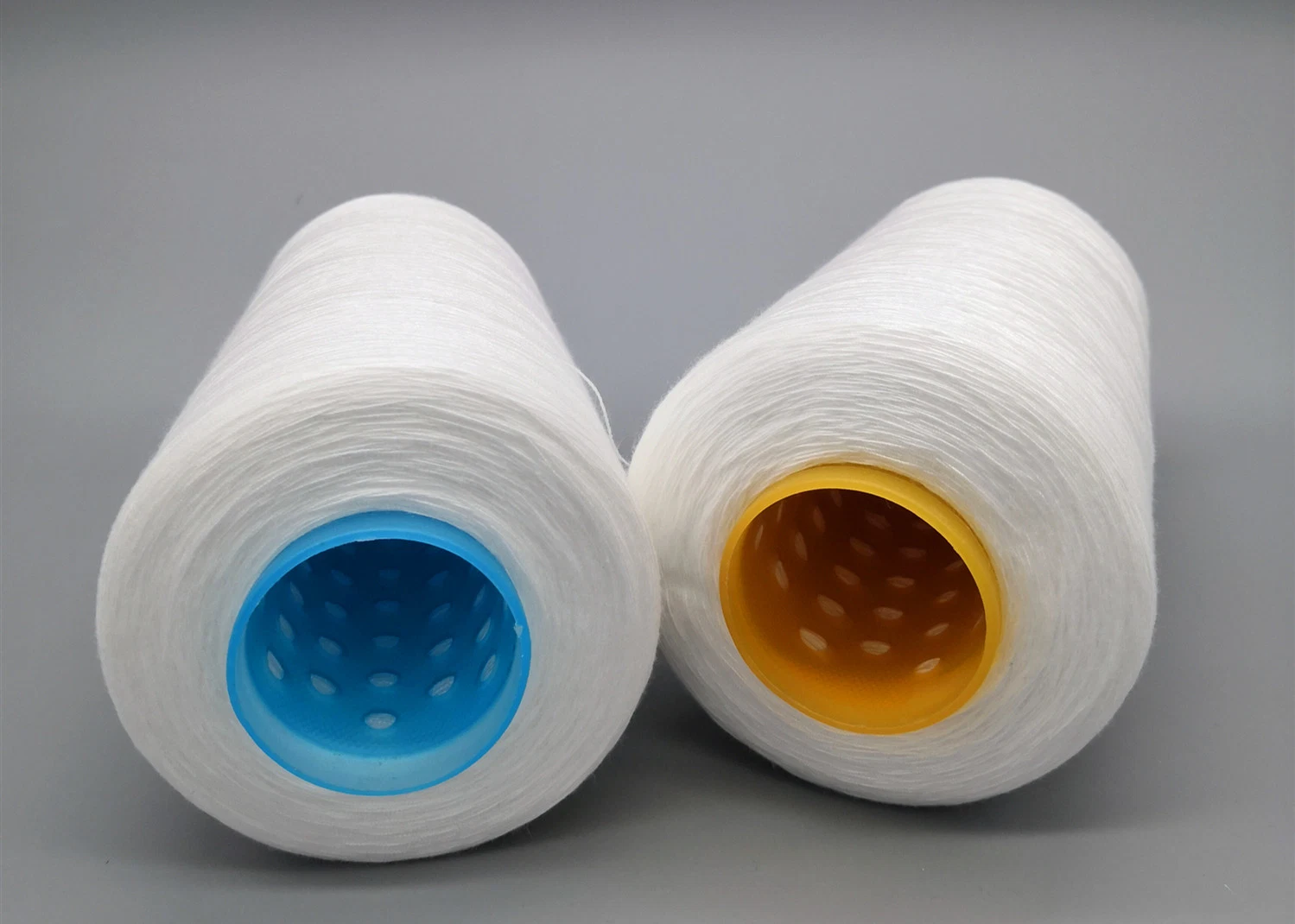 Polyester Thread Yarn 40/2 Micro Polyester Spun Yarn 20/2 Heat Set PP Sp 40/3 Sewing Thread Weaving Polyester Yarn 50/2