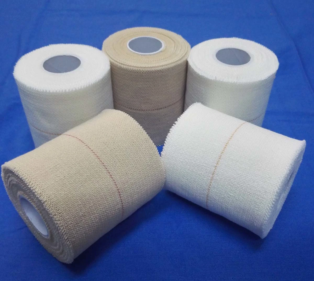 High Stickness Cotton Heavy Elasticity Adhesive Bandage Cotton Soft Edge Eab 5cmx4.5m 7.5cmx4.5m Beige Color with Red Line White Color with Yellow Line