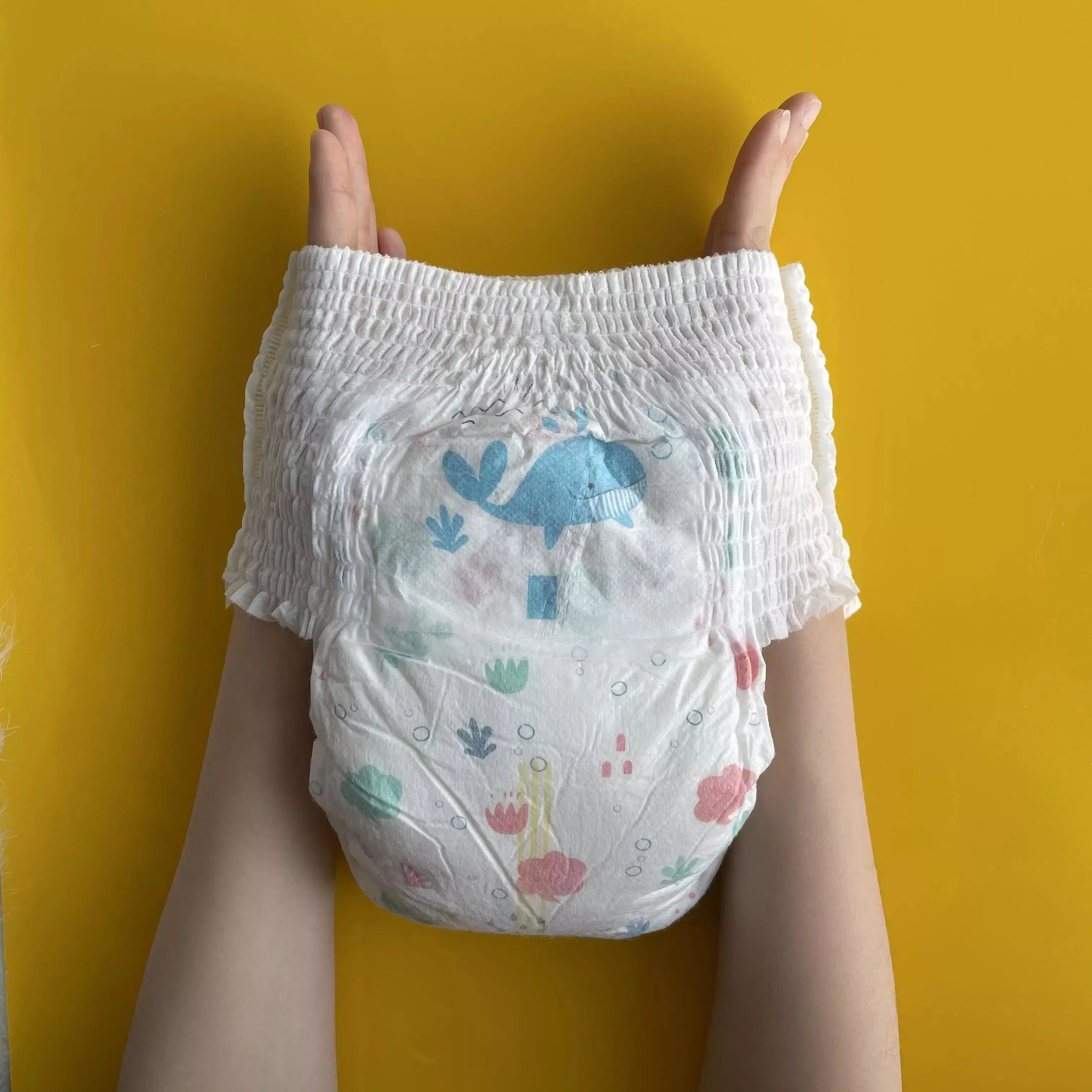 Fábrica de China bebé Pull UPS tejido no tejido de alta calidad a bajo precio B el segundo grado de bebé pantalones en fardos