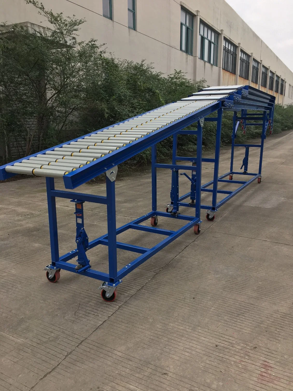 Whole Sales 800mm Width Telescopic Gravity PVC/Steel Unloading Roller Conveyor System