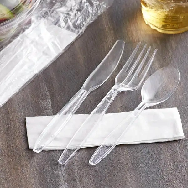 Wholesale/Supplier Biodegradable PLA Plastic Cutlery Set Individual Bag Packaging Napkin Flight Bag Compostable Knife Spoon and Fork Set