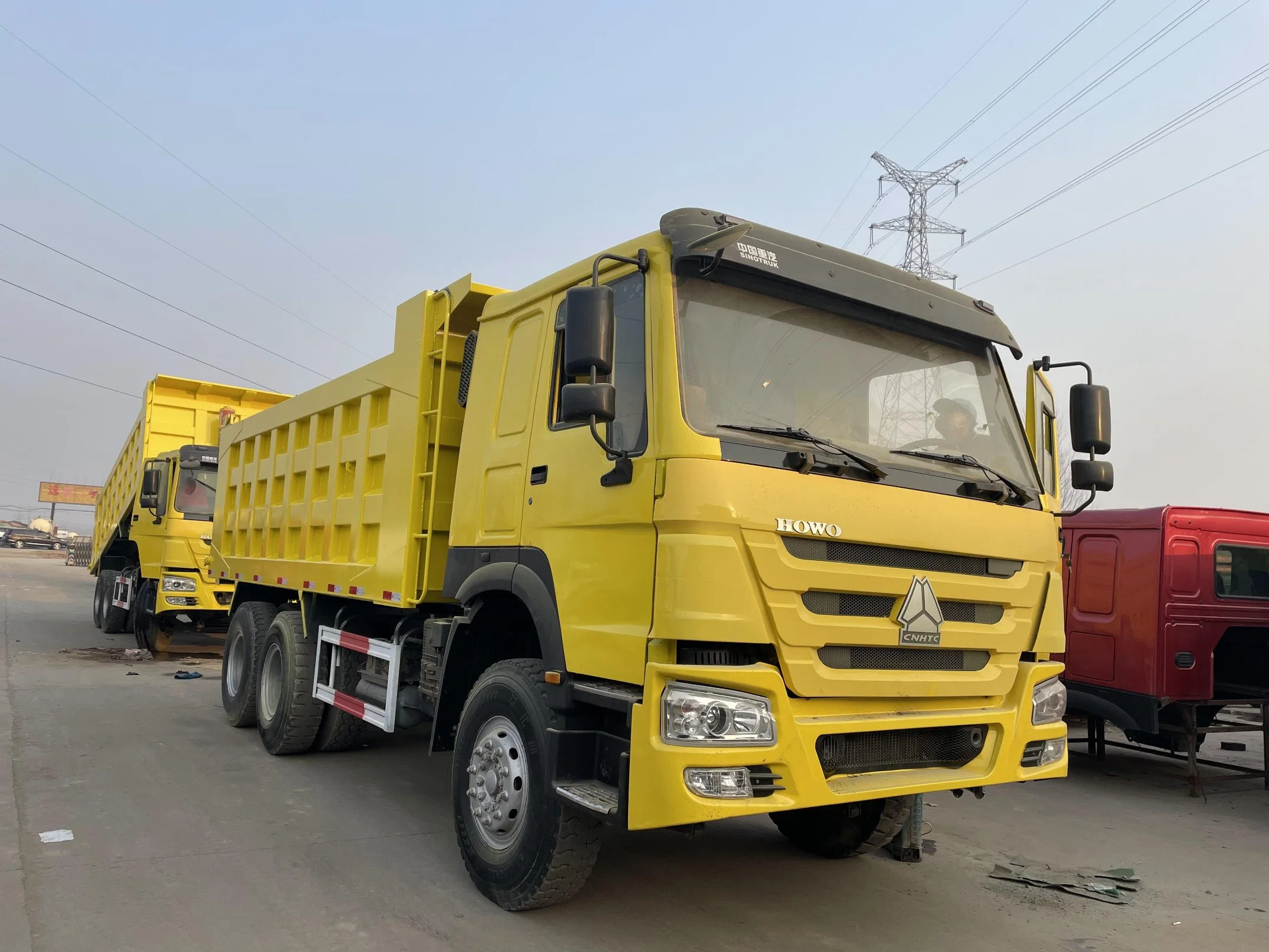 China Truck FAW HOWO JAC Shacman Dongfeng Beiben Foton HOWO Heavy Lorry Used Dump Tipper Truck