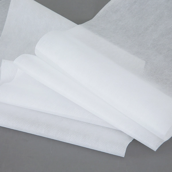 Tejido blanco hidrófilo 100% PP Spunbond no tejido para pañales/sanitarios Material de servilleta