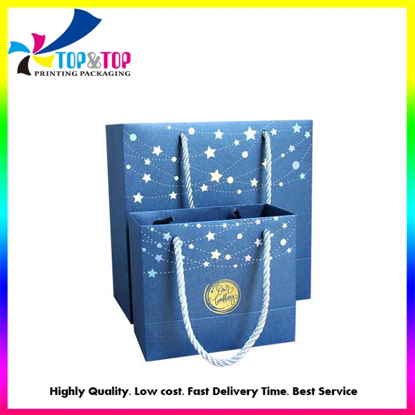 Factory Price Wholesale/Supplier Luxury Blue Hot Stamping Christmas Stars Wedding Candy Suits Paper Packaging Shopping Gift Bag