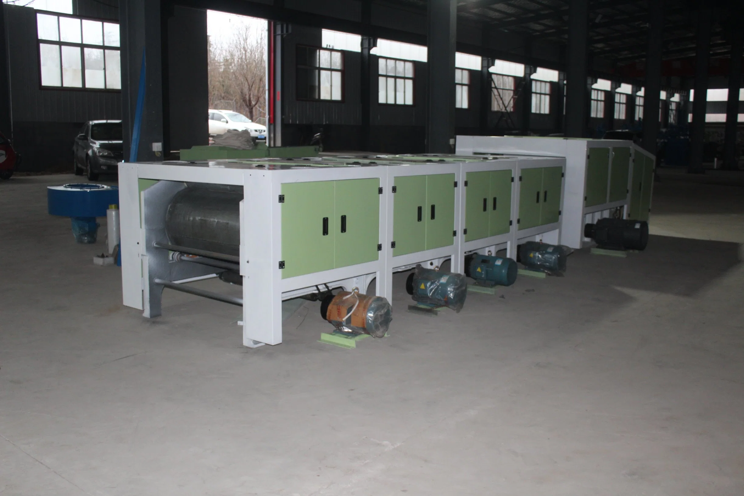 The Textile Waste Recycling Production Line Consists of One Opening Machine and Four Bomb Cleaning Units