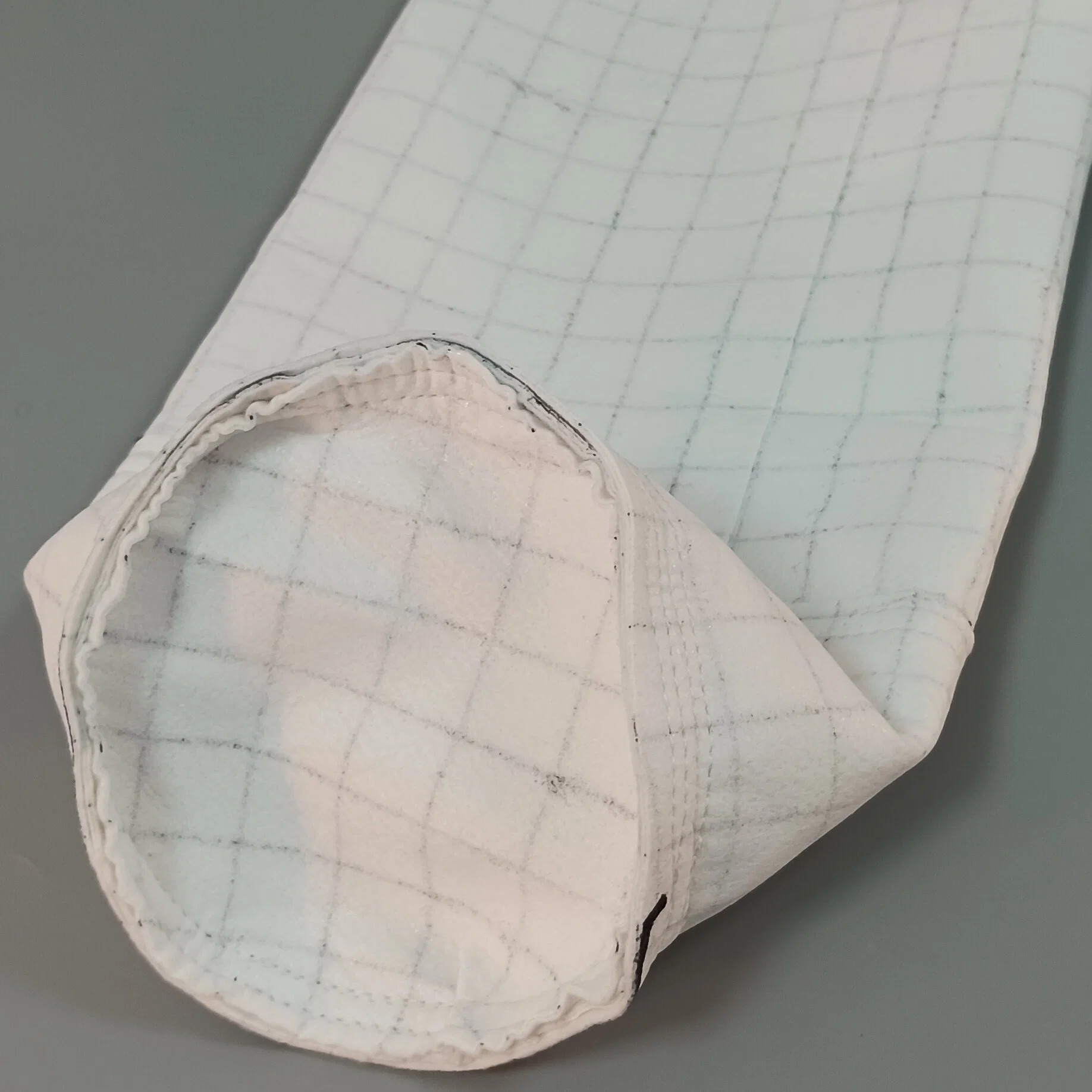 Folded High-Efficiency Filter Bags for Dry Filtration of Dusts