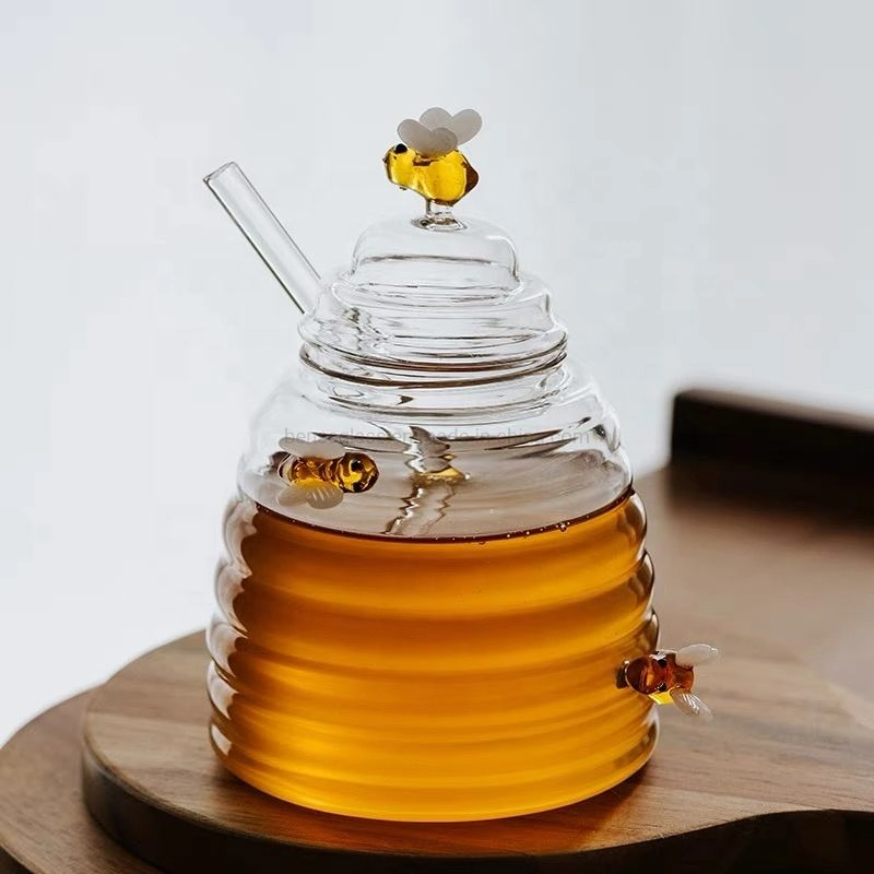 Pot de miel sucré en verre borosilicate de 400 ml en gros avec agitateur.