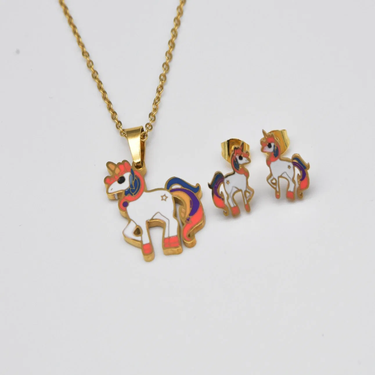 Wholesale/Supplier New Fashion Gold Plated Unicorns Pendant Necklace Earring Jewelry Set for Girls