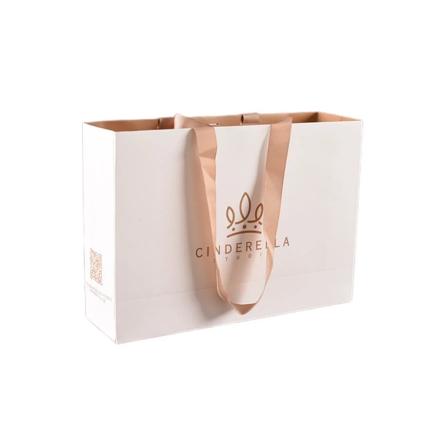 Custom Logo Bags Kraft Paper Tote Bag Shopping Bag with PP Handle for Leisure Apparel Packing