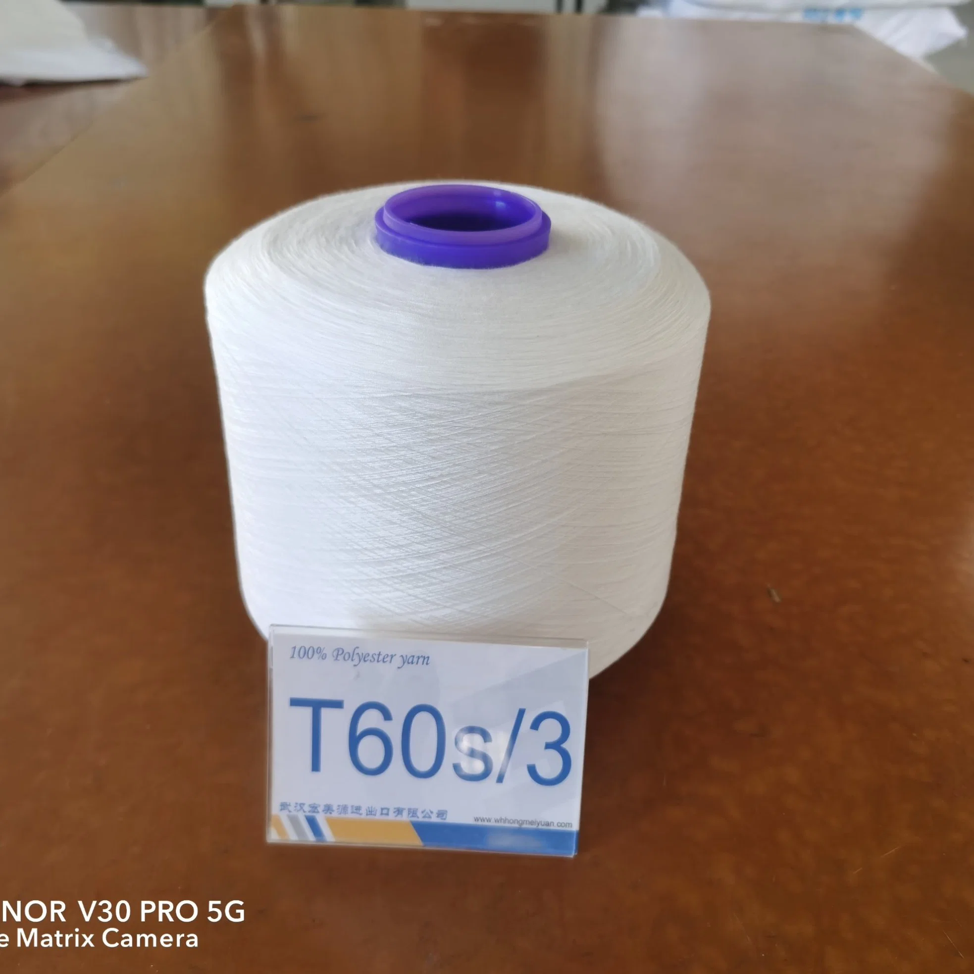 100% Yizheng210 Polyester Spun Yarn Count 60s/3 Tex 27 for Wovens Sportswear General Fabrics