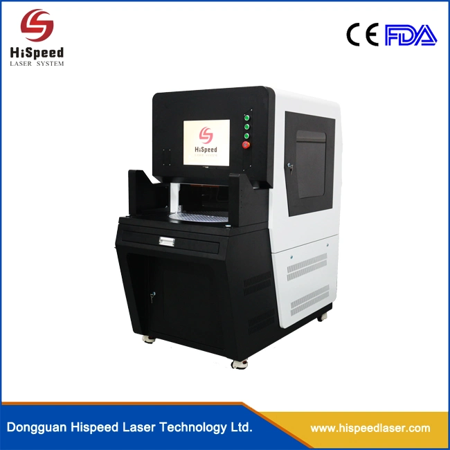Machine de gravure laser à fibre laser haute vitesse avec plateau tournant, utilisée pour la marquage d'outils de coupe et l'automatisation de l'équipement.