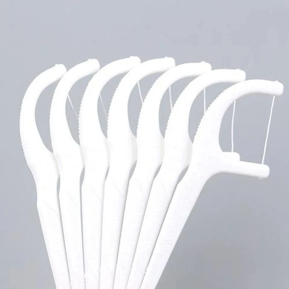 50pcs biodegradables recogida de los dientes Dientes Dental recoge Floss Floss para uso doméstico