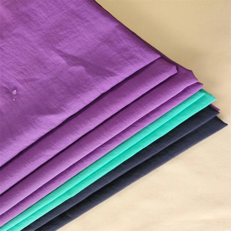 100% Nylon 228t Matte Taslan Cationic Fabric for Outdoor Sportwear Windbreaker Jacket Parka