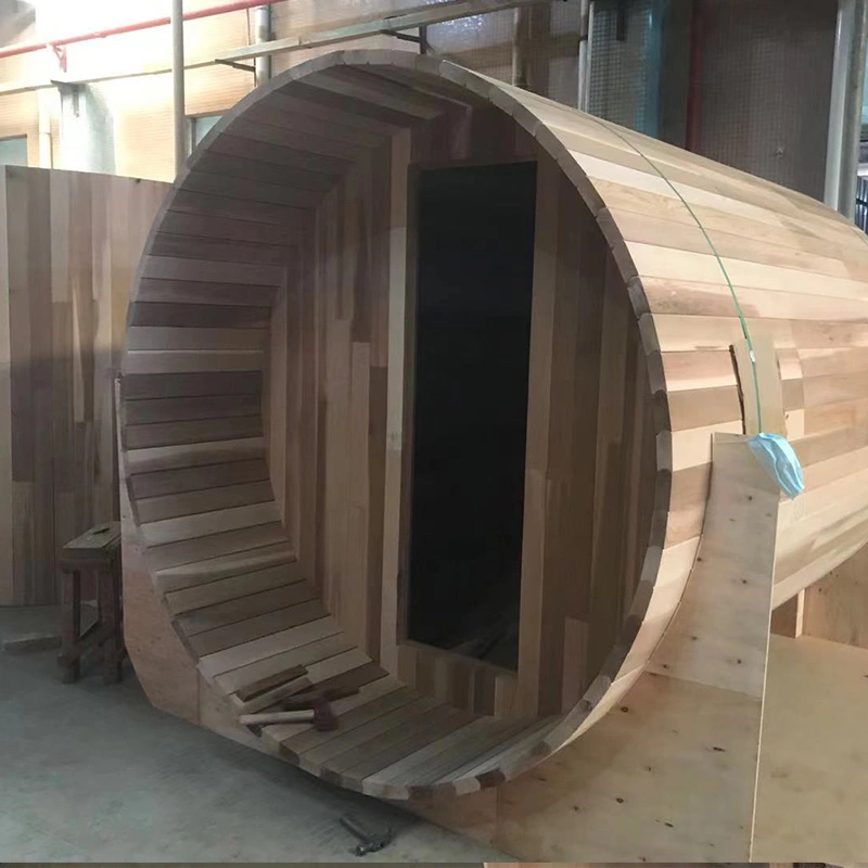 Sauna traditionnel en bois infrarouge à vapeur, sauna extérieur en forme de tonneau.