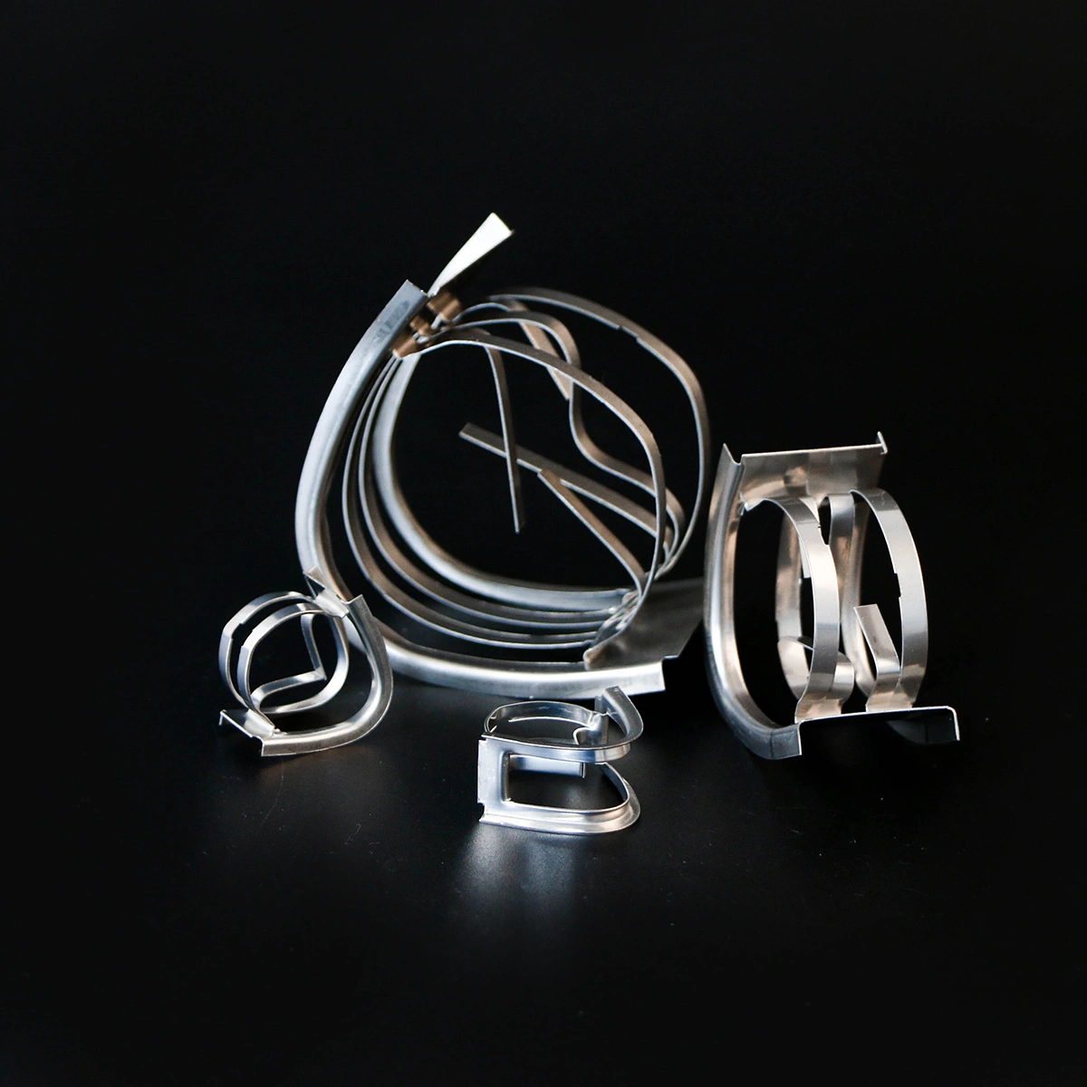 SS316 SS304 Metallic Intalox Saddle Rings for Tower Random Packing 25mm 40mm