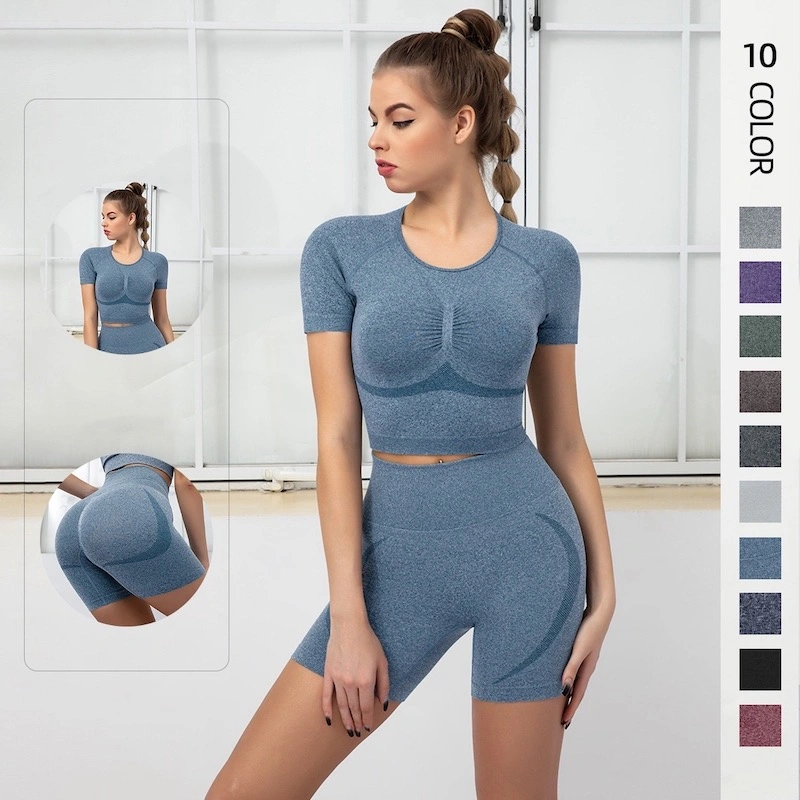 تصميم Tiktok Contour تصميم متطابق Yoga للبيع الساخن يضع ملابس رياضية صيفية للنساء، قميص قص بالأكمام القصيرة أنيق + سروال رفع من الأرداف سروال الركض القصير للبيكر