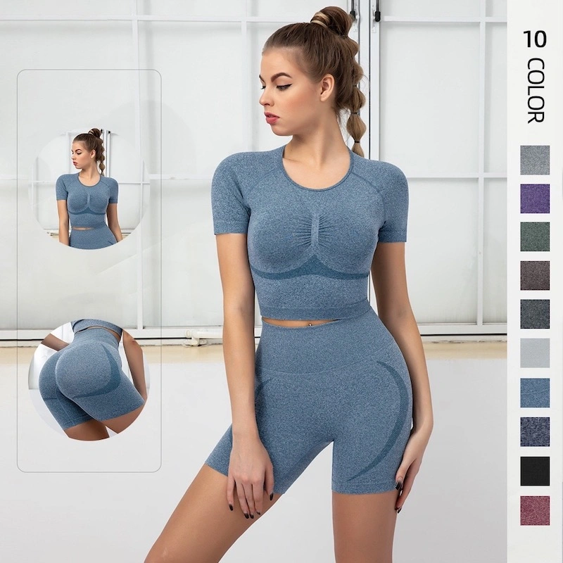 Hot-Sale TikTok Contour Design passende Yoga-Sets Sommer Gym Wear für Frauen, stilvolle Nahtloses Kurzarm Crop Top + Butt Lifting Biker Shorts Laufoutfits